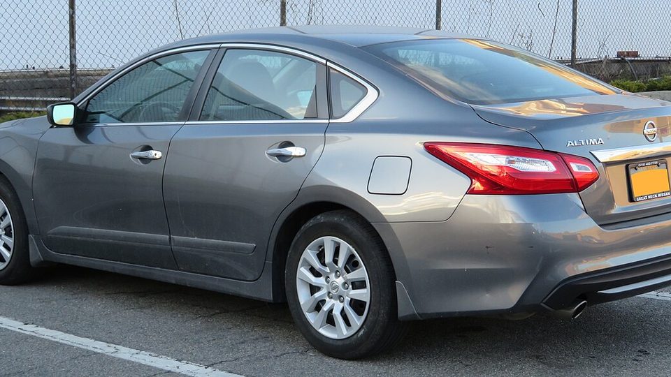 Nissan Altima (fake exhaust tips, blacked out)